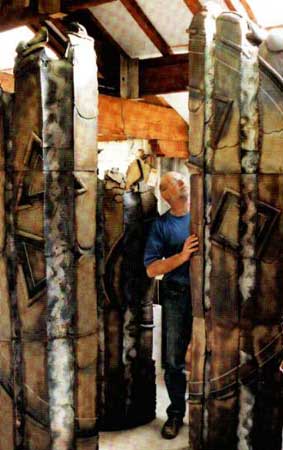 Trial assembly of Elemental Concerns, a sculpture group for the Leicester Royal Infirmary. Coloured slips and cloth textures were applied to its slabs during construction.